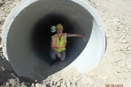 Kari inside a 1.8 m round tunnel at Kouchibouguac National Park