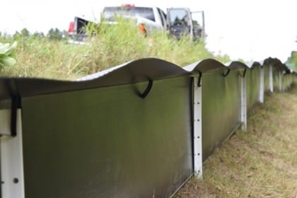 A view of the safe-side of the  fencing, highlighting the smooth surface and angled lip to prevent fence breaches